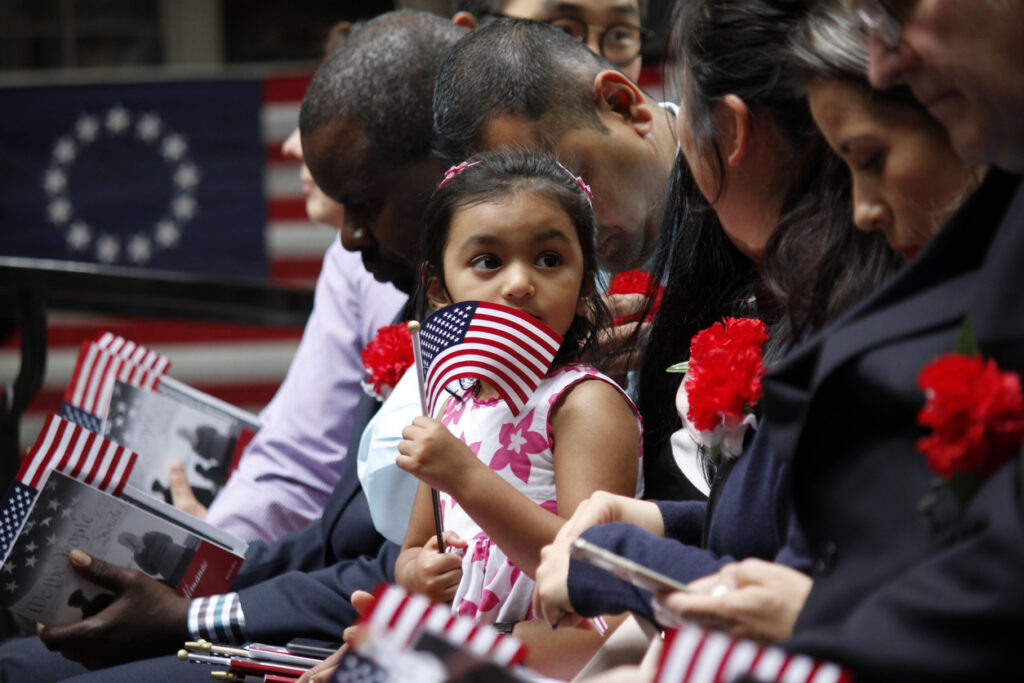 Thirteen immigrants become naturalized United States citizens on Flag Day Amanda Gray Immigration Lawyer